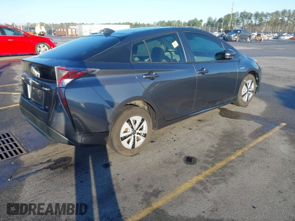 2017 Toyota Prius Two z VIN JTDKARFU4H3042976, wystawiony jako IAAI lot #41740418 z przebiegiem 66 734 mil mil oraz . Historia ofert i sprzedaży dostępna na DreamBid. Obrazek 4.