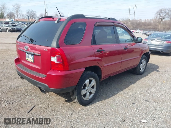 2009 Kia Sportage LX with VIN KNDJF724197558391, listed as a IAAI auction lot 41696362 with 170,555 mi miles. Bid and sale history available at carsss.com. Image 4.