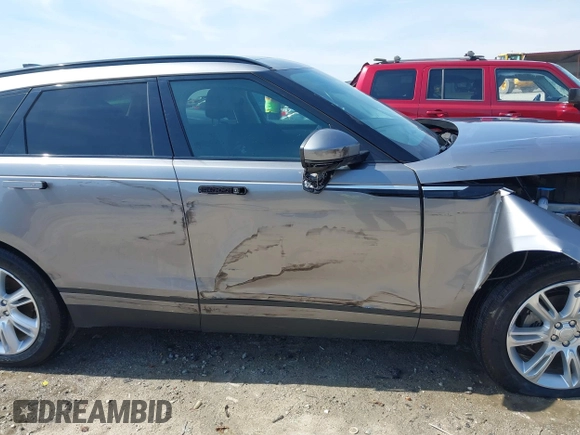 2020 Land Rover Range Rover Velar S z VIN SALYB2EX7LA259607, wystawiony jako IAAI lot #40980294 z przebiegiem 95 967 mil mil oraz . Historia ofert i sprzedaży dostępna na DreamBid. Obrazek 13.