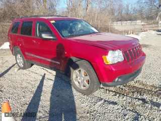 2010 Jeep Grand Cherokee Laredo with VIN 1J4PR4GK2AC135011, listed as a IAAI auction lot 41589996 with 111,536 mi miles. Bid and sale history available at carsss.com. Image 1.