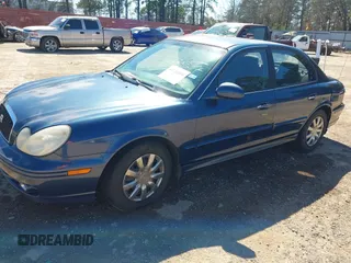 2003 Hyundai Sonata with VIN KMHWF25SX3A790609, listed as a IAAI auction lot 41716098 with 216,240 mi miles. Bid and sale history available at carsss.com. Image 2.