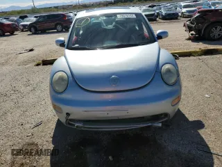 2004 Volkswagen Beetle with VIN 3VWCD31C94M412347, listed as a Copart auction lot 79516144 with 102,542 mi miles and Salvage Title. Bid and sale history available at DreamBid. Image 5.