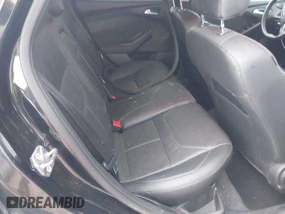 2015 Ford Focus SE with VIN 1FADP3F29FL219561, listed as a IAAI auction lot 42470047 with 98,169 mi miles and . Bid and sale history available at DreamBid. Image 8.