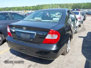 2004 Toyota Camry LE with VIN 4T1BE32K54U270040, listed as a IAAI auction lot 41984769 with Not provided miles and . Bid and sale history available at DreamBid. Image 4.