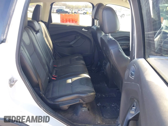 2013 Ford Escape Titanium with VIN 1FMCU0J96DUA71857, listed as a IAAI auction lot 41877003 with 118,864 mi miles and . Bid and sale history available at carsss.com. Image 8.