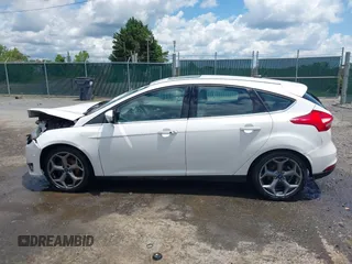 2016 Ford Focus Titanium with VIN 1FADP3N21GL309340, listed as a IAAI auction lot 42518653 with 101,555 mi miles and . Bid and sale history available at DreamBid. Image 14.