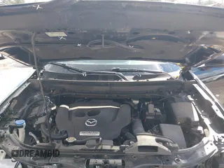 2019 Mazda CX-9 Touring z VIN JM3TCBCY0K0317028, wystawiony jako IAAI lot #41814713 z przebiegiem 155 280 mil mil oraz . Historia ofert i sprzedaży dostępna na DreamBid. Obrazek 10.