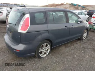 2010 Mazda 5 Sport with VIN JM1CR2WLXA0370650, listed as a IAAI auction lot 41602072 with 142,611 mi miles and . Bid and sale history available at DreamBid. Image 4.