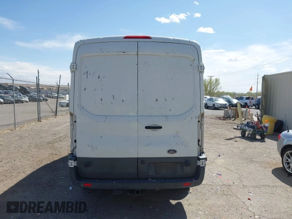 2016 Ford Transit Cargo z VIN 1FTYR2CG7GKB54149, wystawiony jako IAAI lot #41631962 z przebiegiem 151 824 mil mil oraz . Historia ofert i sprzedaży dostępna na DreamBid. Obrazek 16.
