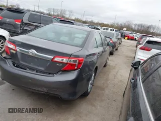 2014 Toyota Camry L with VIN 4T4BF1FK6ER364253, listed as a IAAI auction lot 42011773 with 87,051 mi miles. Bid and sale history available at carsss.com. Image 4.