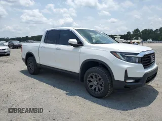 2023 Honda Ridgeline RTL-E with VIN 5FPYK3F7XPB027874, listed as a Copart auction lot 63771315 with 11,945 mi miles and Salvage title. Bid and sale history available at DreamBid. Image 4.