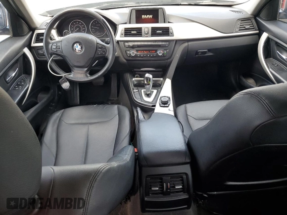 2014 BMW 3 Series 320i xDrive with VIN WBA3C3G51ENS72023, listed as a Copart auction lot 58595225 with 104,315 mi miles and Salvage title. Bid and sale history available at DreamBid. Image 8.