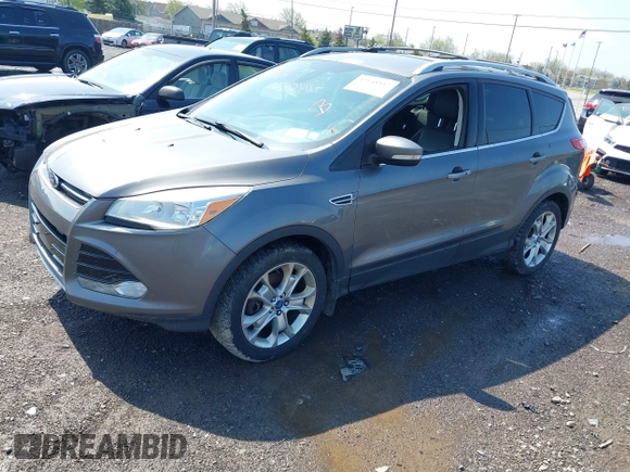 2014 Ford Escape Titanium with VIN 1FMCU9J99EUA75276, listed as a IAAI auction lot 42148537 with 163,330 mi miles and . Bid and sale history available at DreamBid. Image 17.