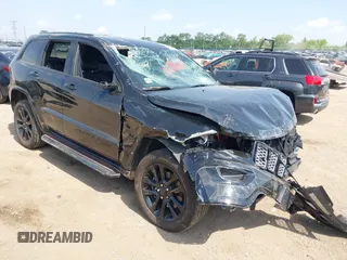 2022 Jeep Grand Cherokee Laredo E with VIN 1C4RJFAG1NC116347, listed as a IAAI auction lot 42275790 with 30,119 mi miles and . Bid and sale history available at DreamBid. Image 1.