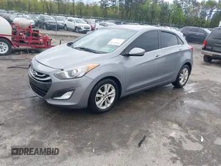 2013 Hyundai Elantra GT with VIN KMHD35LE1DU058318, listed as a IAAI auction lot 42036716 with 146,845 mi miles. Bid and sale history available at carsss.com. Image 17.