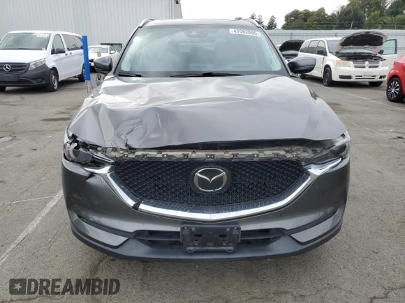2018 Mazda CX-5 S Premium with VIN JM3KFBDM1J1352233, listed as a Copart auction lot 47082655 with 70,350 mi miles and Salvage Title. Bid and sale history available at DreamBid. Image 5.