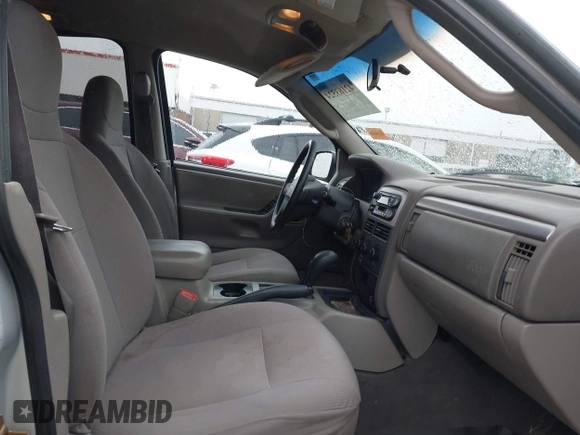 2004 Jeep Grand Cherokee Laredo z VIN 1J4GW48S64C132172, wystawiony jako IAAI lot #42163524 z przebiegiem 170 952 mil mil oraz . Historia ofert i sprzedaży dostępna na DreamBid. Obrazek 5.