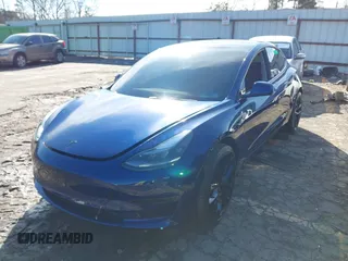2023 Tesla Model 3 Long Range with VIN 5YJ3E1EB0PF688172, listed as a IAAI auction lot 41411580 with 21,125 mi miles and . Bid and sale history available at DreamBid. Image 19.