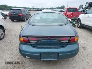 1996 Ford Taurus LX with VIN 1FALP53S3TG177324, listed as a IAAI auction lot 42622520 with 126,979 mi miles and . Bid and sale history available at DreamBid. Image 16.