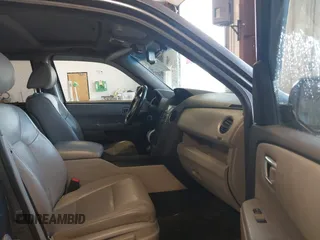 2010 Honda Pilot Touring with VIN 5FNYF4H89AB026005, listed as a IAAI auction lot 42118607 with 182,689 mi miles. Bid and sale history available at carsss.com. Image 5.