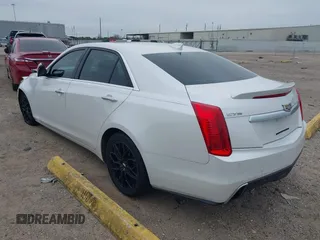 2019 Cadillac CTS RWD with VIN 1G6AP5SX0K0121219, listed as a IAAI auction lot 41239899 with 84,588 mi miles and . Bid and sale history available at DreamBid. Image 3.
