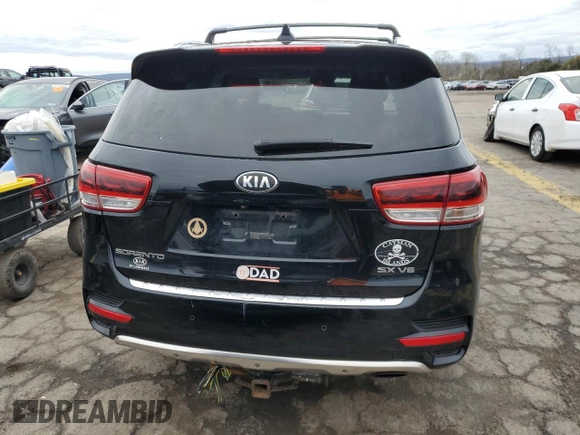 2016 Kia Sorento SX with VIN 5XYPKDA54GG072186, listed as a Copart auction lot 51854425 with 101,087 mi miles and Salvage Title. Bid and sale history available at carsss.com. Image 6.