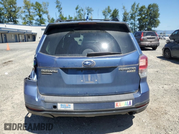 2017 Subaru Forester Touring with VIN JF2SJAWC2HH429099, listed as a Copart auction lot 64671135 with 104,709 mi miles and Salvage title. Bid and sale history available at DreamBid. Image 6.