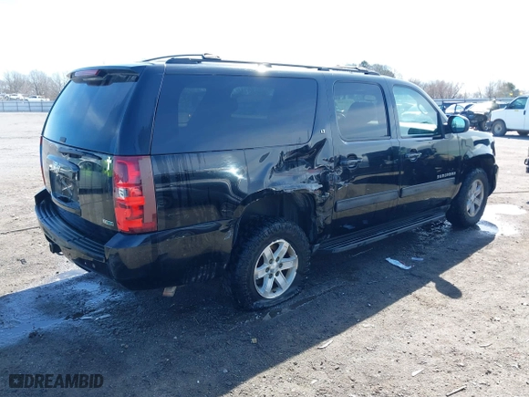 2010 Chevrolet Suburban LT with VIN 1GNUKJE35AR147956, listed as a IAAI auction lot 41722353 with 277,153 mi miles. Bid and sale history available at carsss.com. Image 4.