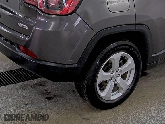2020 Jeep Compass Latitude with VIN 3C4NJDBB8LT214802, listed as a IAAI auction lot 42249989 with 89,389 mi miles and . Bid and sale history available at DreamBid. Image 1.