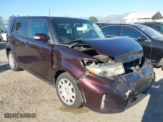 2013 Scion xB with VIN JTLZE4FEXDJ040738, listed as a IAAI auction lot 41878175 with 119,801 mi miles. Bid and sale history available at carsss.com. Image 1.
