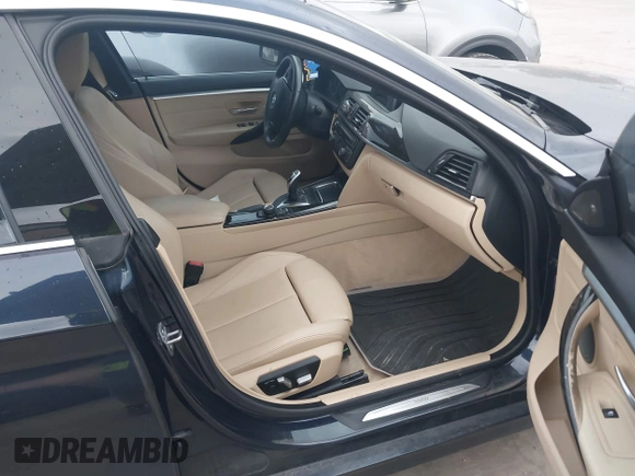 2016 BMW 4 Series 428i z VIN WBA4A9C5XGGL89545, wystawiony jako IAAI lot #41959630 z przebiegiem 61 908 mil mil oraz . Historia ofert i sprzedaży dostępna na DreamBid. Obrazek 5.