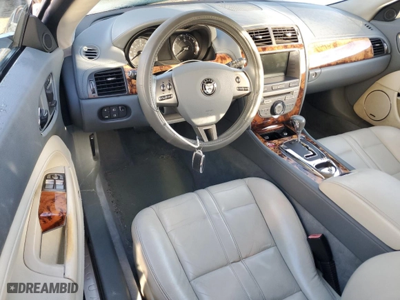 2008 Jaguar XK with VIN SAJWA44B485B23961, listed as a Copart auction lot 84052674 with 209,719 mi miles and Salvage Title. Bid and sale history available at carsss.com. Image 8.