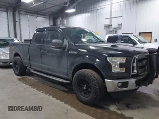2015 Ford F-150 XLT with VIN 1FTFX1EF9FFB74356, listed as a IAAI auction lot 41443778 with 168,086 mi miles. Bid and sale history available at carsss.com. Image 1.