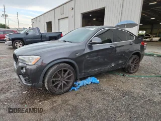 2016 BMW X4 xDrive28i with VIN 5UXXW3C5XG0R20586, listed as a Copart auction lot 60651555 with 111,699 mi miles and Salvage title. Bid and sale history available at DreamBid. Image 1.