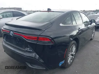 2021 Toyota Mirai XLE with VIN JTDAAAAA1MA002323, listed as a IAAI auction lot 42034157 with 16,592 mi miles and . Bid and sale history available at carsss.com. Image 4.