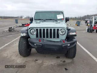 2023 Jeep Wrangler Rubicon with VIN 1C4JJXFG7PW654564, listed as a IAAI auction lot 41833534 with 22,277 mi miles and . Bid and sale history available at DreamBid. Image 12.