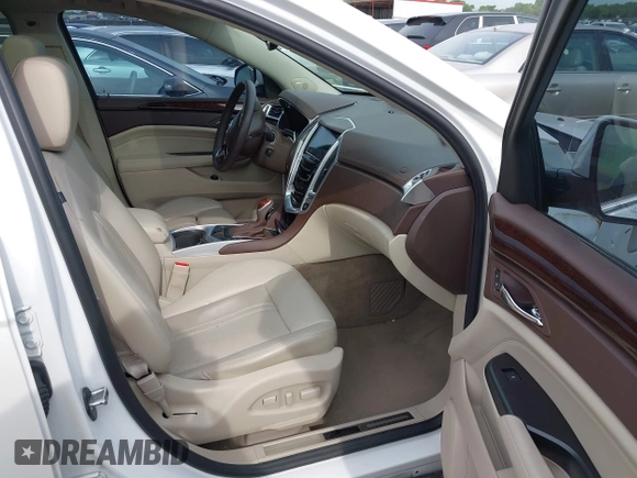 2013 Cadillac SRX Premium Collection with VIN 3GYFNEE36DS508381, listed as a IAAI auction lot 42164119 with 85,810 mi miles and . Bid and sale history available at DreamBid. Image 5.