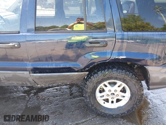 2004 Jeep Grand Cherokee Laredo z VIN 1J4GW48S44C204714, wystawiony jako IAAI lot #42137857 z przebiegiem 251 591 mil mil oraz . Historia ofert i sprzedaży dostępna na DreamBid. Obrazek 6.