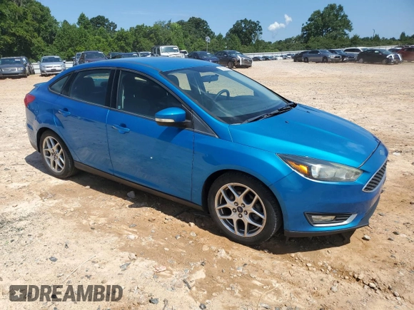 2015 Ford Focus SE with VIN 1FADP3F24FL200786, listed as a Copart auction lot 62662855 with 90,790 mi miles and Salvage title. Bid and sale history available at DreamBid. Image 4.