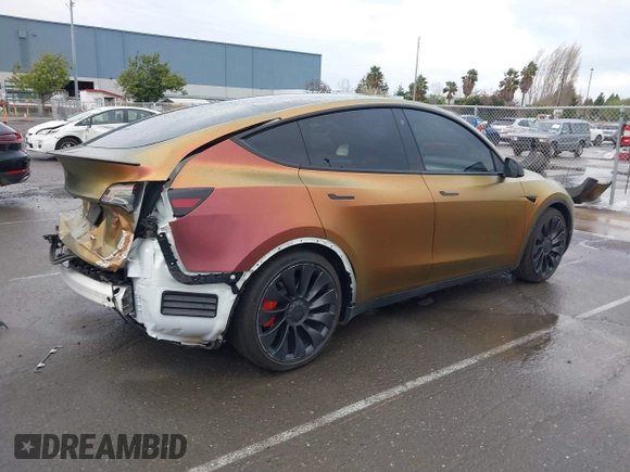 2023 Tesla Model Y Performance with VIN 7SAYGDEF4PF738885, listed as a IAAI auction lot 41798997 with 59,270 mi miles and . Bid and sale history available at DreamBid. Image 4.
