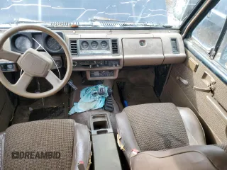 1991 Isuzu Trooper z VIN JACCH58E3M7900325, wystawiony jako Copart lot #79525294 z przebiegiem 146 593 mil mil oraz Czysty tytuł • Clean title. Historia ofert i sprzedaży dostępna na DreamBid. Obrazek 8.