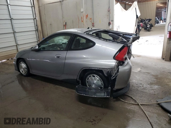 2000 Honda Insight with VIN JHMZE1376YT000164, listed as a Copart auction lot 53851695 with 72,940 mi miles and Salvage title. Bid and sale history available at DreamBid. Image 2.