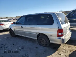 2003 Kia Sedona LX with VIN KNDUP131236371153, listed as a Copart auction lot 80989974 with 205,181 mi miles and Salvage Title. Bid and sale history available at carsss.com. Image 2.