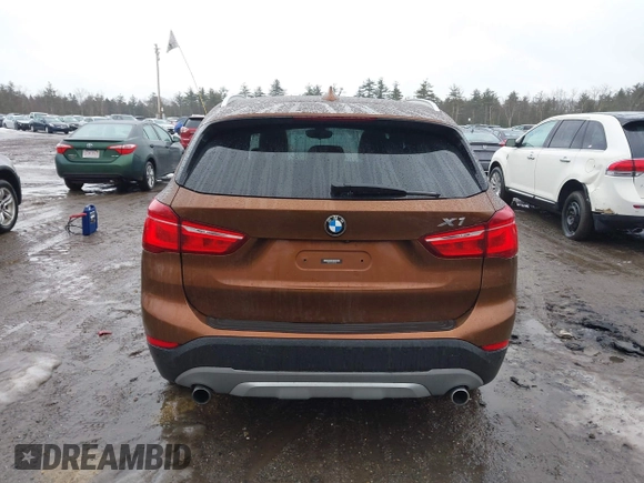 2016 BMW X1 xDrive28i with VIN WBXHT3C31GP881488, listed as a IAAI auction lot 41693116 with 120,922 mi miles. Bid and sale history available at carsss.com. Image 16.