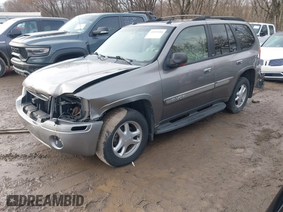 2005 GMC Envoy SLT with VIN 1GKDT13S752276414, listed as a IAAI auction lot 41052684 with 200,919 mi miles. Bid and sale history available at carsss.com. Image 2.