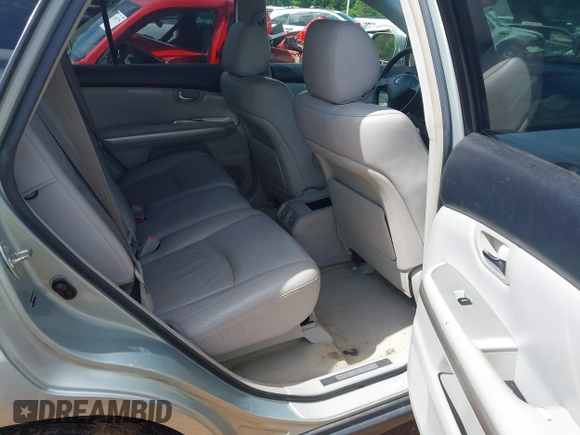2006 Lexus RX 400h z VIN JTJHW31U960006826, wystawiony jako IAAI lot #42231108 z przebiegiem 319 742 mil mil oraz . Historia ofert i sprzedaży dostępna na DreamBid. Obrazek 8.