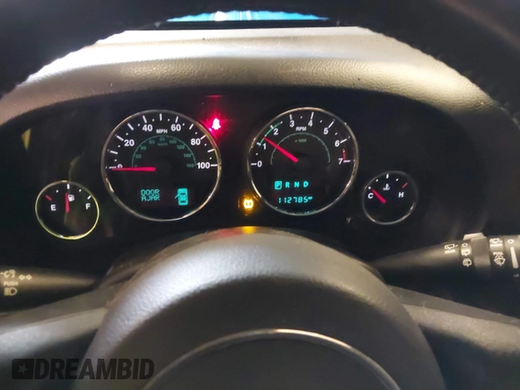 2015 Jeep Wrangler Unlimited Rubicon with VIN 1C4BJWFG7FL661643, listed as a IAAI auction lot 41291385 with 112,785 mi miles. Bid and sale history available at carsss.com. Image 7.