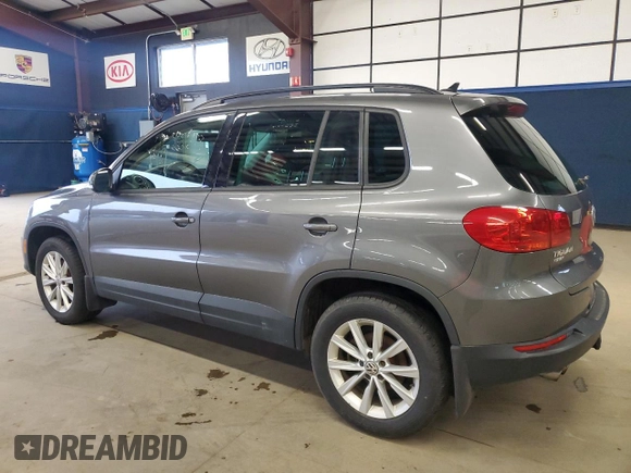 2015 Volkswagen Tiguan SE z VIN WVGBV7AX8FW574023, wystawiony jako Copart lot #50027465 z przebiegiem 101 145 mil mil oraz Czysty tytuł • Clean title. Historia ofert i sprzedaży dostępna na DreamBid. Obrazek 2.