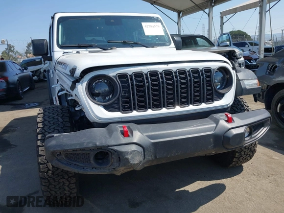 2024 Jeep Wrangler Rubicon with VIN 1C4PJXFG1RW300794, listed as a IAAI auction lot 42784578 with 22,652 mi miles and . Bid and sale history available at DreamBid. Image 12.