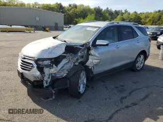 2019 Chevrolet Equinox Premier z VIN 2GNAXYEX6K6105776, wystawiony jako Copart lot #56398095 z przebiegiem Nie podano mil oraz Szkoda całkowita • Salvage title. Historia ofert i sprzedaży dostępna na DreamBid. Obrazek 1.